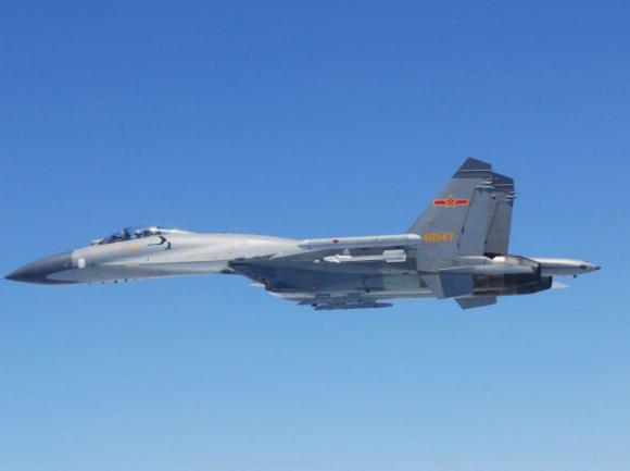 http://tiananmenstremendousachievements.files.wordpress.com/2014/05/a-chinese-su-27-fighter-flies-over-the-east-china-sea.jpg