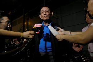 Former Philippine President Fidel Ramos speaks to journalists as he arrives at Hong Kong International Airport, China August 8, 2016. REUTERS/Tyrone Siu